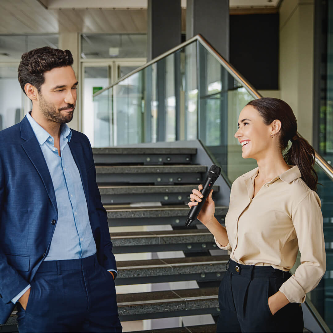 Two-person interview with Interview PRO by staircase