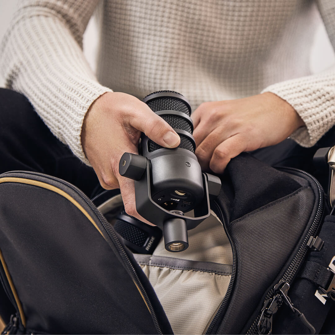 PodMic USB being placed into Backpack